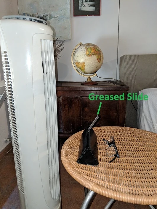 a tower fan and greased slide on reading glasses pyramid cover